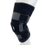 Closeup of adjustable aluminum hinge on hinged knee brace for meniscus injury